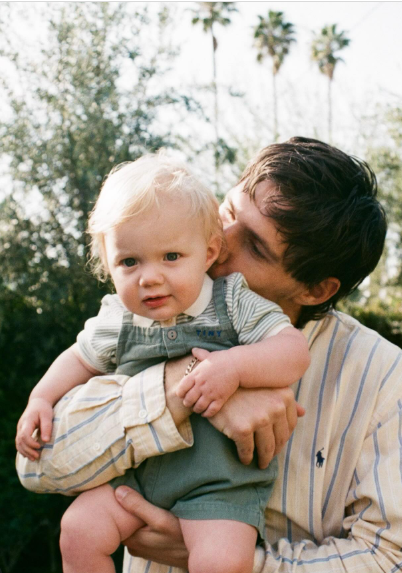 Jake holding baby
